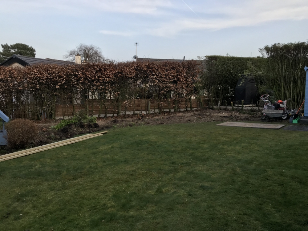 Large garden during hedge and border work