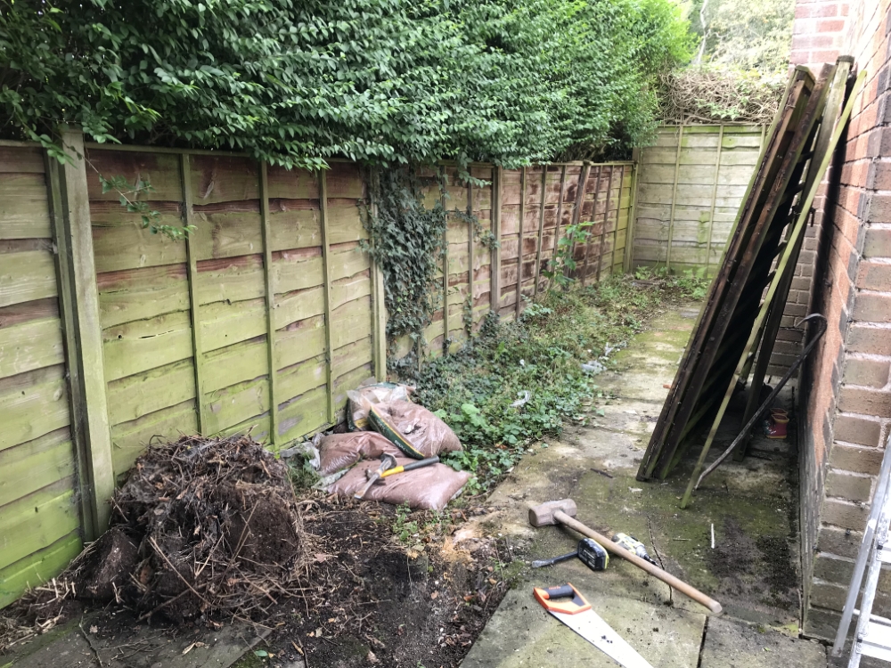 Side garden during clearance and fence work